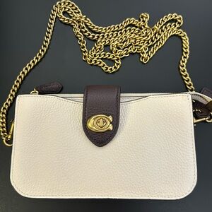 Coach purse cream colored clutch bag with brown/gold details